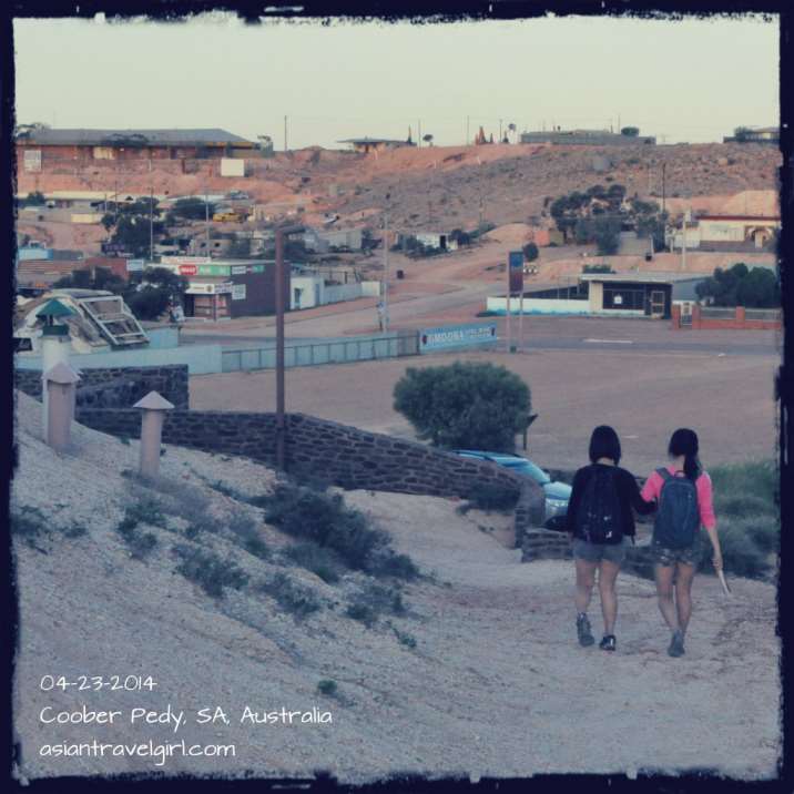 Coober Pedy from above. Random chimney coming out from the sandy hills.